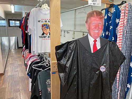 ADAM TREUSCH / FREE PRESS
A cardboard cutout of Donald Trump with a garbage bag over it, in reference to a comment President Joe Biden made, at the Trump Store in Lake Park, Minn.
