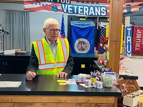 ADAM TREUSCH / FREE PRESS
George Frankberg behind the counter at the Trump Store in Lake Park, Minn., on Saturday. 