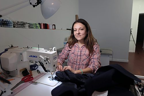 BoujoreN Tailoring Studio owner Nadia Buzhor amends a jacket in her studio on Monday. Buzhor says her new business reflects her desire not just to serve, but to elevate Brandon’s fashion landscape. (Abiola Odutola/The Brandon Sun)