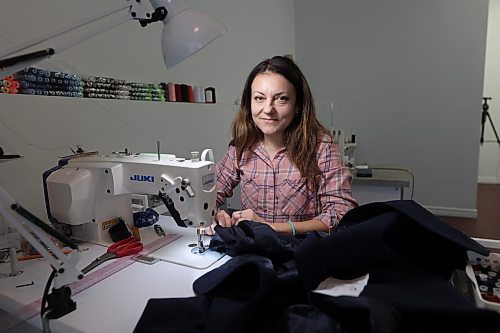 BoujoreN Tailoring Studio owner Nadia Buzhor amends a jacket in her studio on Monday. Buzhor says her new business reflects her desire not just to serve, but to elevate Brandon’s fashion landscape.  (Abiola Odutola/The Brandon Sun)