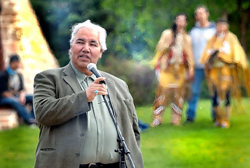 WAYNE.GLOWACKI@FREEPRESS.MB.CA  Heat rises from the sacred fire in the centre of the Oodena Celebration Circle at The Forks Wednesday as Justice Murray Sinclair, chair of the Truth and Reconciliation Commission of Canada speaks in recognition of Canada's National Day of Healing for Residential School Survivors.  Kevin Rollason story.  Winnipeg Free Press May 25  2010