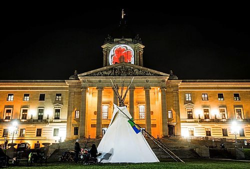 JOHN WOODS / FREE PRESS
Smoke billows from a teepee containing a fire for Murray Sinclair, who died this morning at St boniface Hospital, as it sits on the legislature grounds Monday November 4, 2024. Sinclair was 73.

Reporter: maggie