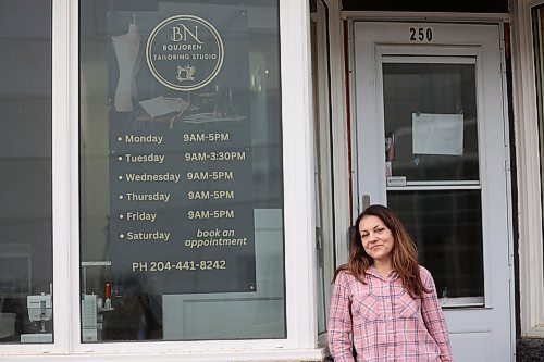 BoujoreN Tailoring Studio owner Nadia Buzhor poses for a picture in front of her studio on Monday. (Abiola Odutola/The Brandon Sun)