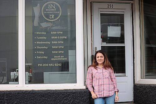 BoujoreN Tailoring Studio owner Nadia Buzhor poses for a picture in front of her studio on Monday. (Abiola Odutola/The Brandon Sun)