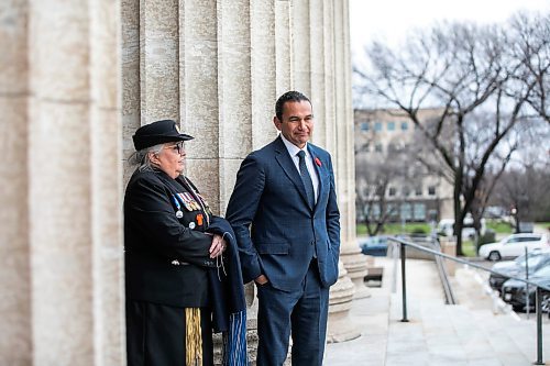 MIKAELA MACKENZIE / FREE PRESS
	
Premier Wab Kinew and Indigenous Veterans Day founder RandiGage stand at the entrance to the Manitoba Legislative Building to greet people after paying their respects to Murray Sinclair at a sacred fire lit inside a teepee in front of the Manitoba Legislative Building in Winnipeg on Monday, Nov. 4, 2024.


Winnipeg Free Press 2024