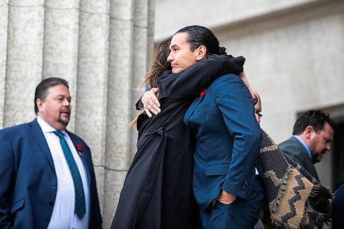 MIKAELA MACKENZIE / FREE PRESS
	
Premier Wab Kinew and housing, addictions, and homelessness minister Bernadette Smith embrace after paying their respects to Murray Sinclair at a sacred fire lit inside a teepee in front of the Manitoba Legislative Building in Winnipeg on Monday, Nov. 4, 2024.


Winnipeg Free Press 2024