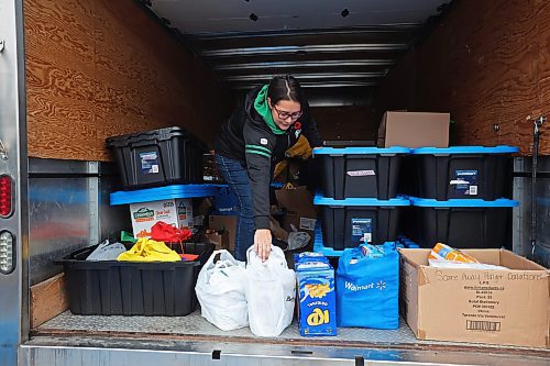 04112024
Carla Mitchell with the Cedar Hollow haunted house on Cedar Bay in Brandon helps Tytan Durgan with Samaritan House Ministries load nonperishable foods and other donated items into the back of a Samaritan House truck on Monday morning after visitors to the haunted house donated over 1500 items for the food bank along with approximately $300. The Samaritan House Ministries food bank sees demand for approximately 100 hampers per day and up to 150 hampers on busier days. The total number of hampers distributed in 2023 was around 35,000. (Tim Smith/The Brandon Sun)