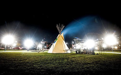 JOHN WOODS / FREE PRESS
Smoke billows from a teepee containing a fire for Murray Sinclair, who died this morning at St boniface Hospital, as it sits on the legislature grounds Monday November 4, 2024. Sinclair was 73.

Reporter: maggie