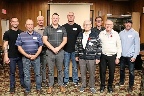 Zack McMillan, left to right, Jim White, Rick Degagne, Matt Degagne, Clark Andres, Al Robertson, Brody Pinkerton, Murray Zuk and Chris Kennedy are shown as the Brandon and western Manitoba inductees in the Manitoba Baseball Hall of Fame induction class of 2025. (Matt Packwood/The Brandon Sun)