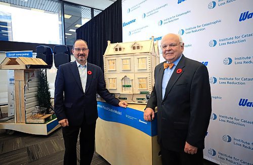 Ruth Bonneville / Free Press

Biz - Wawanesa presser

Paul Kovacs, Executive Director, Institute of Catastrophic Loss Reduction, and Jeff Goy (left), President and CEO, Wawanesa Insurance stand next to a model of a home that is equipped with better technology to handle extreme weather.   The news event was part of the grand opening of the Institute for Catastrophic Loss Reduction's Climate Resilience Centre held at Wawanesa Insurance's head office Tuesday.

See Martin Cash story.



Nov 5th,  2024