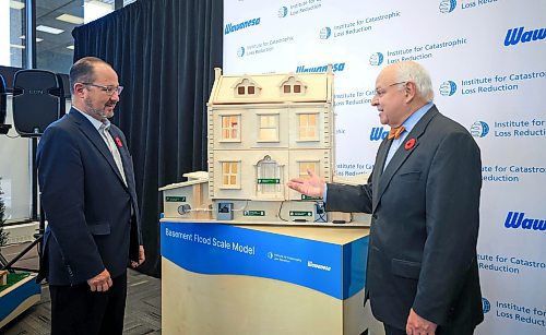 Ruth Bonneville / Free Press

Biz - Wawanesa presser

Paul Kovacs, Executive Director, Institute of Catastrophic Loss Reduction, and Jeff Goy (left), President and CEO, Wawanesa Insurance stand next to a model of a home that is equipped with better technology to handle extreme weather.   The news event was part of the grand opening of the Institute for Catastrophic Loss Reduction's Climate Resilience Centre held at Wawanesa Insurance's head office Tuesday.

See Martin Cash story.



Nov 5th,  2024