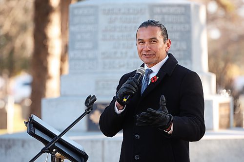 05112024
Manitoba Premier Wab Kinew speaks at the Brandon War Memorial during the annual No Stone Left Alone ceremony at the Brandon Cemetery on Tuesday morning. Hundreds, including students from multiple Brandon school&#x2019;s, took part in the event meant to honour soldiers who lost their lives in wars. 
(Tim Smith/The Brandon Sun)