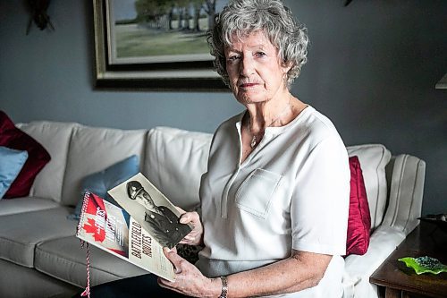 MIKAELA MACKENZIE / FREE PRESS
	
Carol Ellerbeck, who went on the In Our Fathers&#x560;Footsteps trip to the Netherlands in 2022, with photos of her late father Bob Ellerbeck (who served during WW2) on Wednesday, Nov. 6, 2024.

For Kevin story.
Winnipeg Free Press 2024