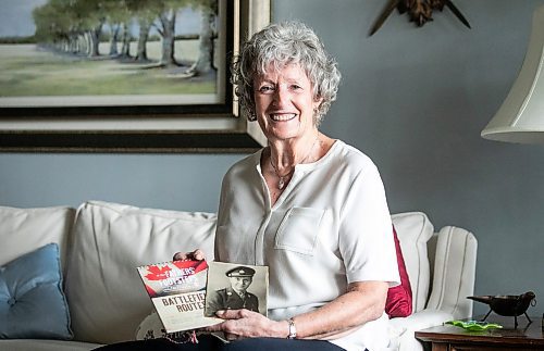 MIKAELA MACKENZIE / FREE PRESS
	
Carol Ellerbeck, who went on the In Our Fathers&#x560;Footsteps trip to the Netherlands in 2022, with photos of her late father Bob Ellerbeck (who served during WW2) on Wednesday, Nov. 6, 2024.

For Kevin story.
Winnipeg Free Press 2024