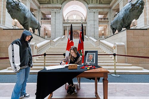 MIKE DEAL / FREE PRESS
Carmen Valkova signs a book of condolences for Murray Sinclair, the first Indigenous judge to be named to the Manitoba provincial court and the Court of Queen&#x2019;s Bench of Manitoba, has been placed at the foot of the Grand Staircase in the Manitoba Legislative Building.
The book will be available to sign 8 a.m. to 8 p.m. until Sunday.
241106 - Wednesday, November 06, 2024.