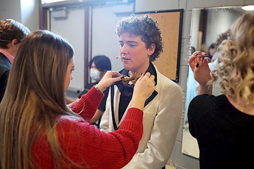 07112024
Mia Visser helps Ben Ginn-Desjarlais with his tie backstage during Vincent Massey High School&#x2019;s presentation of Grease at the Western Manitoba Centennial Auditorium on Thursday afternoon. The musical opened Thursday and runs until Saturday. 
(Tim Smith/The Brandon Sun)