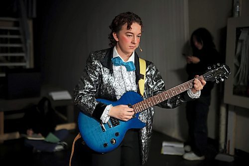 07112024
Aria Rempel, playing Johnny Casino, focuses before taking the stage for the second half of Vincent Massey High School&#x2019;s presentation of Grease at the Western Manitoba Centennial Auditorium on Thursday afternoon. The musical opened Thursday and runs until Saturday. 
(Tim Smith/The Brandon Sun)