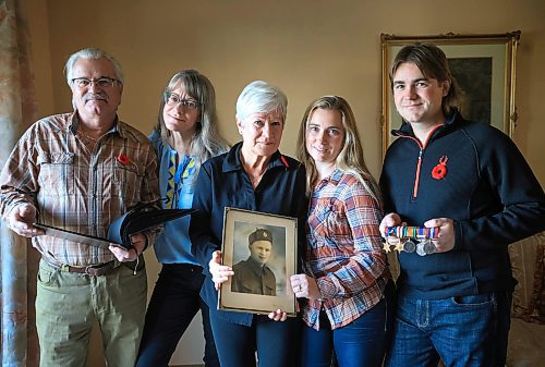 RUTH BONNEVILLE / FREE PRESS

LOCAL - WWll VET

Family Group photo with photo of  WWII veteran, Gus Wasiuta. 

Names from Left:  Steve Wasiuta (Gus' son), Alyssa Rempel (granddaughter to Gus), Darlene Clark (Gus' daughter), Kylie Wasiuta (Steves daughter/ Gus grandaughter) and Cole Wasiuta (Steves daughter/ Gus grandaughter). 


For Remembrance Day, a piece profiling a Ukrainian soldier who is related to a WWII veteran from Winnipeg.

The WWII veteran&#x573; name was Gus Wasiuta. He died a few years back, at the age of 98yrs.  These photos are of his family in Winnipeg who Melissa is interviewing.  

Group photos of the family in various groupings and his medals and such. (We will also have art from Ukraine of the soldier here, and submitted vintage photos of Gus.)

Melissa Martin story for Saturday's paper.

Names of everyone who is a direct descendant of his at this photo shoot.  Info from family contact. 

Me: Alyssa Rempel
My mom who Melissa talked to (Gus' daughter): Darlene Clark
Gus' son: Steve Wasiuta
Steves son/ Gus grandson: Cole Wasiuta
Steves daughter/ Gus grandaughter: Kylie Wasiuta


Nov 7th, 2024