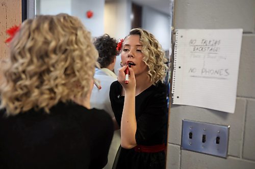 07112024
Anya Visser, playing Cha-Cha Digregorio, prepares backstage for the second half of Vincent Massey High School&#x2019;s presentation of Grease at the Western Manitoba Centennial Auditorium on Thursday afternoon. The musical opened Thursday and runs until Saturday. 
(Tim Smith/The Brandon Sun)