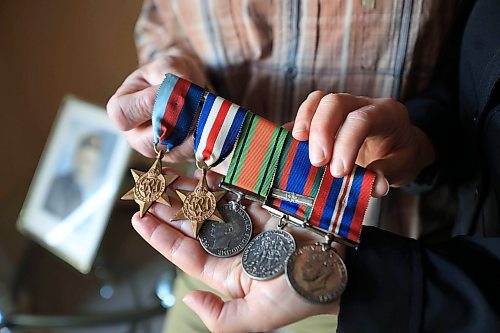 RUTH BONNEVILLE / FREE PRESS

LOCAL - WWll VET

For Remembrance Day, a piece profiling a Ukrainian soldier who is related to a WWII veteran from Winnipeg.

The WWII veteran&#x573; name was Gus Wasiuta. He died a few years back, at the age of 98yrs.  These photos are of his family in Winnipeg who Melissa is interviewing.  

Group photos of the family in various groupings and his medals and such. (We will also have art from Ukraine of the soldier here, and submitted vintage photos of Gus.)

 
Melissa Martin story for Saturday's paper.

Nov 7th, 2024