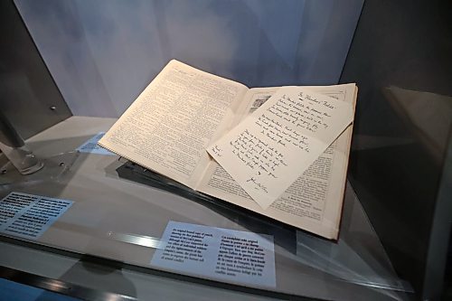 A copy of the "In Flanders' Fields" poem plate as well as an original Dec. 8, 1915 edition of Punch Magazine in which the poem was published, sit in a glass case on display at the RCA Museum at CFB Shilo. (Matt Goerzen/The Brandon Sun)