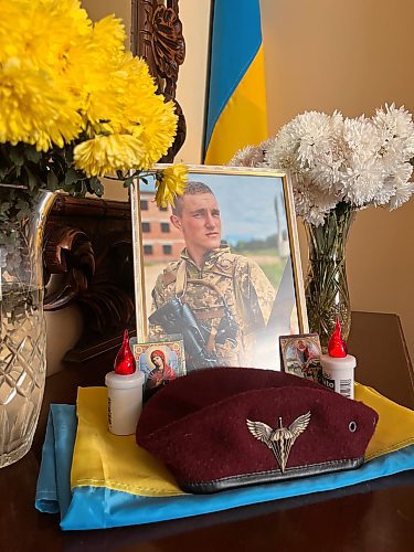 MELISSA MARTIN / FREE PRESS

At Vasyl and Halyna Vasyuta&#x2019;s home in Cherneve, Ukraine, a memorial for their son Dmytro, who was just 20 years old when he was killed early in the full-scale invasion. Four members of the Vasyuta family have served in the current war.

