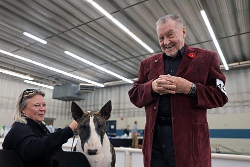 Sandy Bryce, his dog Iain and his wife Amy travelled from Saskatchewan to compete at the competition this weekend. Sandy said he has trained dogs since elementary school, and 20 to 30 have died of old age during this time, taking a piece of his heart with them every time. (Connor McDowell/Brandon Sun)