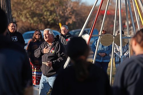 08112024
Dakota knowledge keeper Frank Tacan speaks during an Indigenous Veterans Day ceremony at the teepee in Errol Black Park on Rosser Avenue East on Friday morning. The ceremony was organized by the Brandon Friendship Centre, included a pipe ceremony and prayer, and was followed by a feast. 
(Tim Smith/The Brandon Sun)