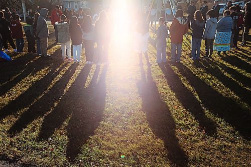 08112024
Students listen to Dakota knowledge keeper, cultural worker and elder Frank Tacan speak during an Indigenous Veterans Day ceremony at the teepee in Errol Black Park on Rosser Avenue East on Friday morning. The ceremony was organized by the Brandon Friendship Centre, included a pipe ceremony and prayer, and was followed by a feast. 
(Tim Smith/The Brandon Sun)