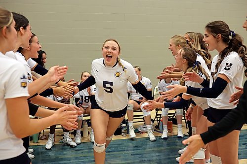 08112024
Megan Pickford #5 of the Brandon University Bobcats is cheered on by teammates as she takes to the court for the first set of the Bobcats home-opener against the University of Saskatchewan Huskies at the BU Healthy Living Centre on Friday evening.  
(Tim Smith/The Brandon Sun)