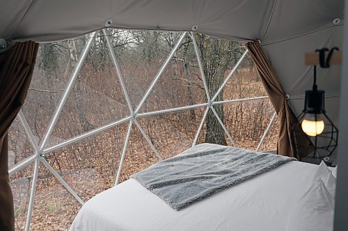 Three cabins on the property are built as domes, with the bed facing a large window, and electronic heat and humidity control, a skylight, a bathroom, a hot tub and a barbecue. (Connor McDowell/Brandon Sun)