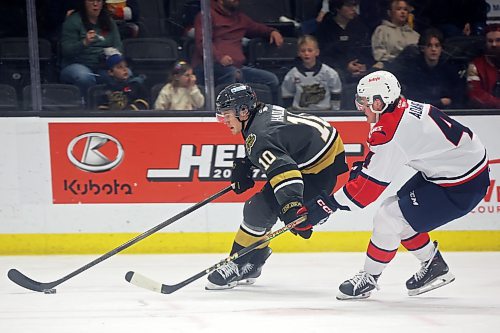 11112024
Caleb Hadland #10 of the Brandon Wheat Kings moves the puck up ice with Carsen Adair #4 of the Lethbridge Hurricanes in pursuit during WHL action at Westoba Place on Monday afternoon.  (Tim Smith/The Brandon Sun)