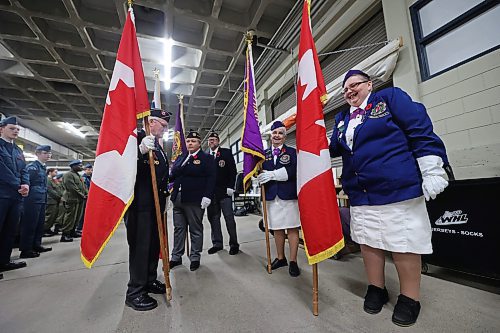 Members of the Colour Party talk and laugh together before Brandon's Remembrance Day ceremony at the Keystone Centre on Monday morning. (Matt Goerzen/The Brandon Sun)