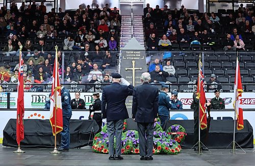 A salute is given after the last wreath is placed at the Remembrance Day cenotaph on Monday morning at the Keystone Centre. (Matt Goerzen/The Brandon Sun)