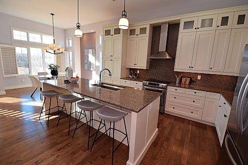 Todd Lewys / Free Press
The island kitchen is filled with natural light, functionality and style.