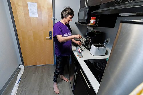 MIKE DEAL / FREE PRESS
Carol Lynch has been living in a hotel since the Birchwood Terrace apartment building was evacuated six months ago. She is in a kitchenette with her dog Trixie. The province is still paying for rooms for at least a handful of evacuees. Lynch said she will return to her suite at Birchwood Terrace when the building is deemed safe again. She said Ladco should be covering hotel costs, not the province.
Reporter: Chris Kitching 
241112 - Tuesday, November 12, 2024.