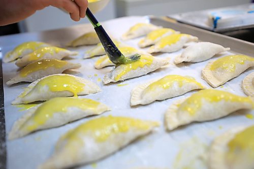 RUTH BONNEVILLE / FREE PRESS
Jonatan Laos Zegarra prepares his in-demand empanadas in a commercial kitchen in La Salle.