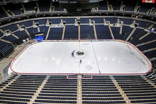 MIKE SUDOMA / FREE PRESS
Engineers Ryan Jones (left) and David Wright (right) paints the ice surface at centre ice white to prepare for Disney on Ice coming up this weekend

Nov 11, 2024


