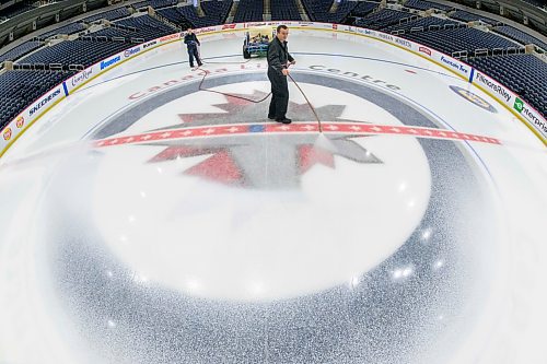 MIKE SUDOMA / FREE PRESS
David Wright (right) paints the ice surface at centre ice white to prepare for Disney on Ice coming up this weekend
Nov 11, 2024


