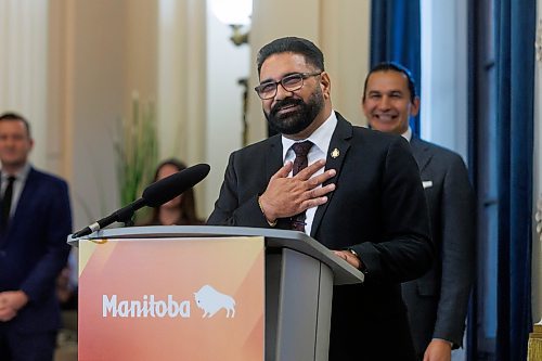 MIKE DEAL / FREE PRESS
Mintu Sandhu (MLA for The Maples) is sworn in as the minister of public service delivery.
Premier Wab Kinew expanded and shuffled his cabinet after a year in office during a ceremony Wednesday morning at the Manitoba Legislative Building. Mike Moroz, the MLA for River Heights, will lead the department of innovation and new technology, an entirely new division. The other two new members of cabinet are Mintu Sandhu (the Maples), who is now minister of the delivery of public services, and Nellie Kennedy (Assiniboia), who is now minister of sport, culture, heritage and tourism.
Jamie Moses (St. Vital) is now minister of business, mining, trade and job creation.
lan Bushie (Keewatinook) is now minister of natural resources. He remains the minister of Indigenous economic development.
Glen Simard (Brandon East) is now minister of municipal and northern relations.
Lisa Naylor (Wolseley) remains minister of transportation and infrastructure but is no longer minister of consumer protection and government services, the news release stated.
Including the premier, there are now 19 cabinet members.
Reporter: Carol Sanders
241113 - Wednesday, November 13, 2024.