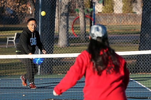 13112024
George Chen and Susan Su take advantage of the beautiful weather to play pickleball at the Stanley Park pickleball courts on a warm Wednesday. Environment Canada has forecast similar daytime high&#x2019;s of close to 10C for today and Friday.
(Tim Smith/The Brandon Sun)