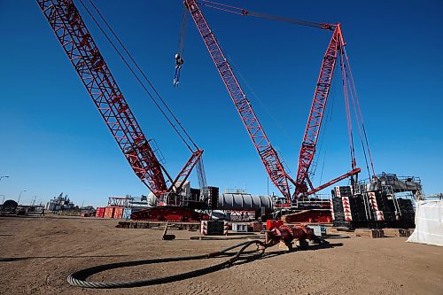 13112024
Large cranes are in place as work is done to install a new 393 metric ton convertor at Koch Fertilizer&#x2019;s Brandon plant on Wednesday. A portion of the convertor is expected to be lifted into place by the enormous cranes today and installation is expected to be done by sometime next week. 
(Tim Smith/The Brandon Sun)