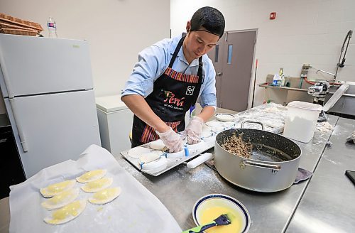 RUTH BONNEVILLE / FREE PRESS

NTERSECTION - Cafe Lima

La Salle Community Centre

Photos of Jonatan Laos Zegarra, owner Cafe Lima, making his famous empanadas in a commercial kitchen in La Salle Wednesday.  

Intersection piece on Jonatan, who started an empanada biz in July 2023.  It's a home-based operation selling six varieties of empanadas. Jonatan grew up in Lima, Peru and met his future wife while attending U of M in 2018. He lost his job in the spring of 2023 and decided to go into business for himself, selling Peruvian-flavoured empanadas. He'd love to have a bricks-and-mortar spot of his own one day, as his name implies, but he's been kept so busy baking for farmer's markets &amp; pop-up sales, that he barely has time for that, at this point - he sells out, almost every time out. 


Dave Sanderson story
 For Nov 16 Intersection 

Nov 13th, 2024