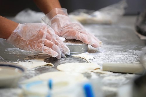 RUTH BONNEVILLE / FREE PRESS

NTERSECTION - Cafe Lima

La Salle Community Centre

Photos of Jonatan Laos Zegarra, owner Cafe Lima, making his famous empanadas in a commercial kitchen in La Salle Wednesday.  

Intersection piece on Jonatan, who started an empanada biz in July 2023.  It's a home-based operation selling six varieties of empanadas. Jonatan grew up in Lima, Peru and met his future wife while attending U of M in 2018. He lost his job in the spring of 2023 and decided to go into business for himself, selling Peruvian-flavoured empanadas. He'd love to have a bricks-and-mortar spot of his own one day, as his name implies, but he's been kept so busy baking for farmer's markets &amp; pop-up sales, that he barely has time for that, at this point - he sells out, almost every time out. 


Dave Sanderson story
 For Nov 16 Intersection 

Nov 13th, 2024