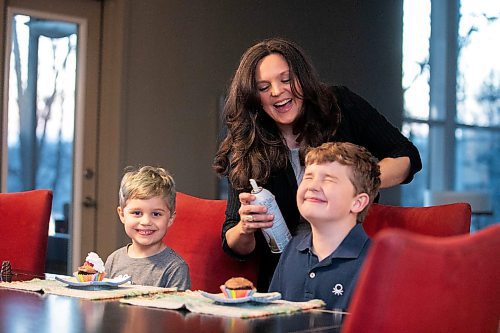 MIKAELA MACKENZIE / FREE PRESS
	
Desirae Mercer and her children, Jacob Reimer (eight) and Zavier Reimer (five), eat a vegan dessert on Wednesday, Nov. 13, 2024. Mercer feels that raising her kids vegan helps them to think more about the foods they eat, about where their toys and clothes come from, and their impact on the planet. 

For Janine green page story.
Winnipeg Free Press 2024