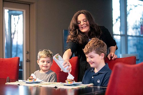 MIKAELA MACKENZIE / FREE PRESS
	
Desirae Mercer and her children, Jacob Reimer (eight) and Zavier Reimer (five), eat a vegan dessert on Wednesday, Nov. 13, 2024. Mercer feels that raising her kids vegan helps them to think more about the foods they eat, about where their toys and clothes come from, and their impact on the planet. 

For Janine green page story.
Winnipeg Free Press 2024