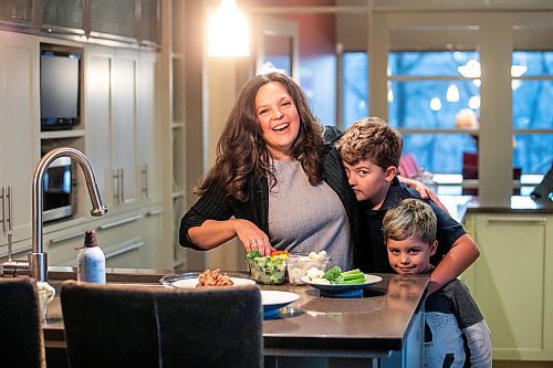 MIKAELA MACKENZIE / FREE PRESS
	
Desirae Mercer and her children, Jacob Reimer (eight) and Zavier Reimer (five), prepare bean tacos on Wednesday, Nov. 13, 2024. Mercer feels that raising her kids vegan helps them to think more about the foods they eat, about where their toys and clothes come from, and their impact on the planet. 

For Janine green page story.
Winnipeg Free Press 2024