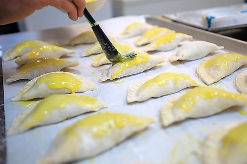 RUTH BONNEVILLE / FREE PRESS

NTERSECTION - Cafe Lima

La Salle Community Centre

Photos of Jonatan Laos Zegarra, owner Cafe Lima, making his famous empanadas in a commercial kitchen in La Salle Wednesday.  

Intersection piece on Jonatan, who started an empanada biz in July 2023.  It's a home-based operation selling six varieties of empanadas. Jonatan grew up in Lima, Peru and met his future wife while attending U of M in 2018. He lost his job in the spring of 2023 and decided to go into business for himself, selling Peruvian-flavoured empanadas. He'd love to have a bricks-and-mortar spot of his own one day, as his name implies, but he's been kept so busy baking for farmer's markets &amp; pop-up sales, that he barely has time for that, at this point - he sells out, almost every time out. 


Dave Sanderson story
 For Nov 16 Intersection 

Nov 13th, 2024