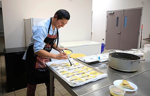 RUTH BONNEVILLE / FREE PRESS

NTERSECTION - Cafe Lima

La Salle Community Centre

Photos of Jonatan Laos Zegarra, owner Cafe Lima, making his famous empanadas in a commercial kitchen in La Salle Wednesday.  

Intersection piece on Jonatan, who started an empanada biz in July 2023.  It's a home-based operation selling six varieties of empanadas. Jonatan grew up in Lima, Peru and met his future wife while attending U of M in 2018. He lost his job in the spring of 2023 and decided to go into business for himself, selling Peruvian-flavoured empanadas. He'd love to have a bricks-and-mortar spot of his own one day, as his name implies, but he's been kept so busy baking for farmer's markets &amp; pop-up sales, that he barely has time for that, at this point - he sells out, almost every time out. 


Dave Sanderson story
 For Nov 16 Intersection 

Nov 13th, 2024