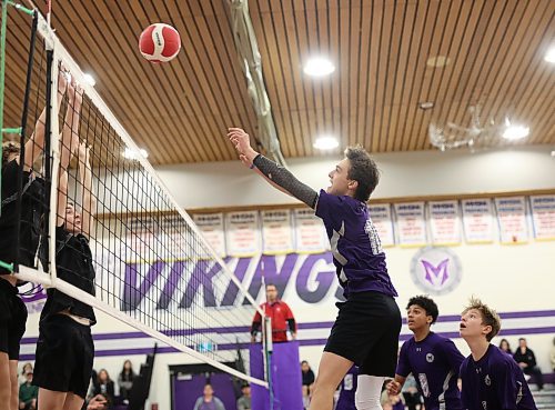 13112024
Sawyer Wallin #10 of the Vincent Massey Vikings puts the ball over the net during the junior varsity volleyball city championship against the Neelin Spartans at VMHS on Wednesday evening. 
(Tim Smith/The Brandon Sun)